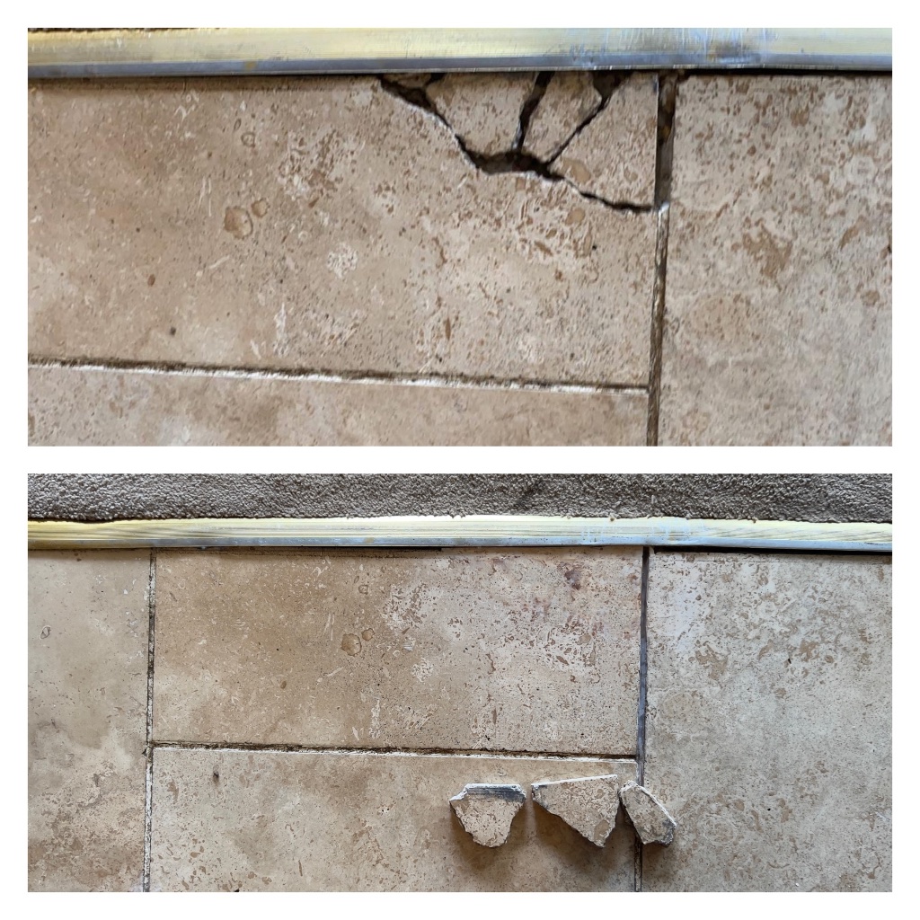 Cracked and damaged floor tiles requiring professional repair