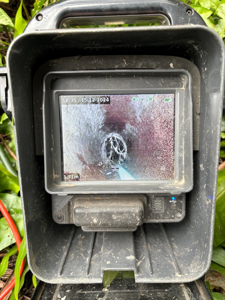 Khaki Plumbing technician performing cctv drain inspections in Brisbane Northside