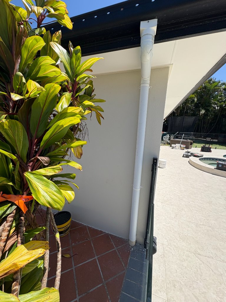 Khaki Plumbing technician performing stormwater drainage in Brisbane Northside