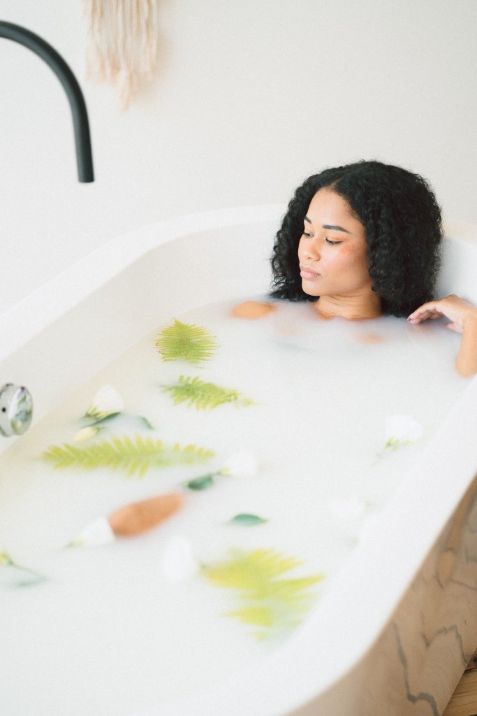 Young woman enjoying luxury bath