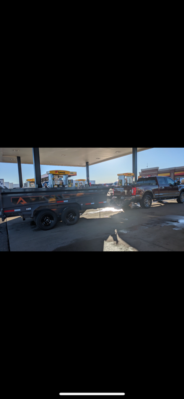 Car hauler trailer hooked up to truck Precision Rentals Wellington CO