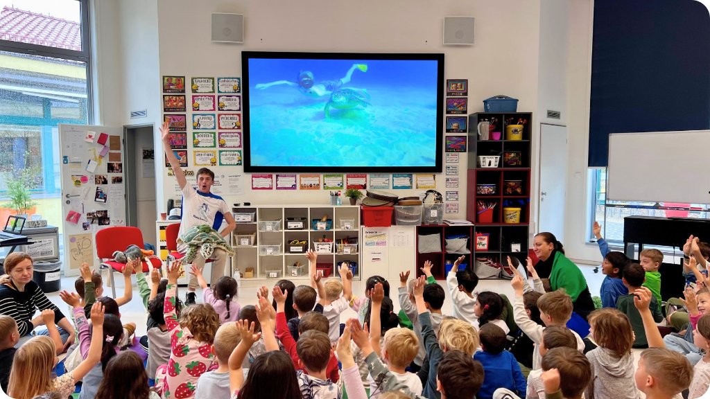 Children watching ocean adventure