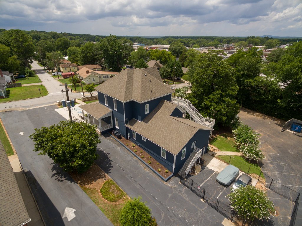 Bird's eye view Historic Austell House with downtown Austell Georgia visible in background aerial photography