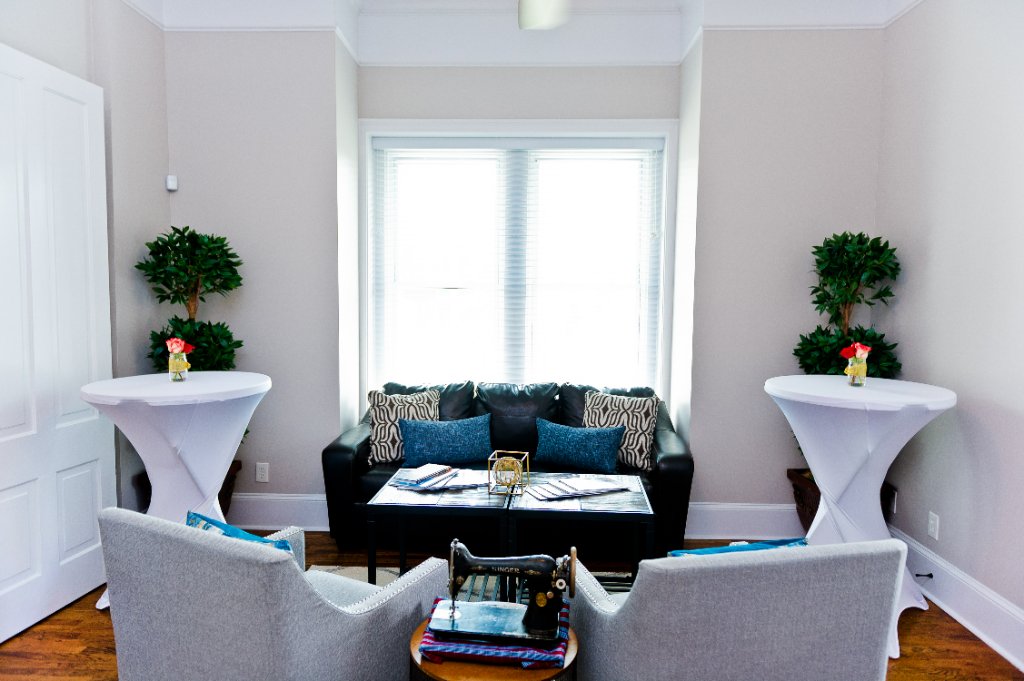 Professional workspace with seating area and vintage hardwood floors