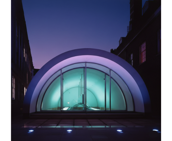 Iconic illuminated concert venue dome at night