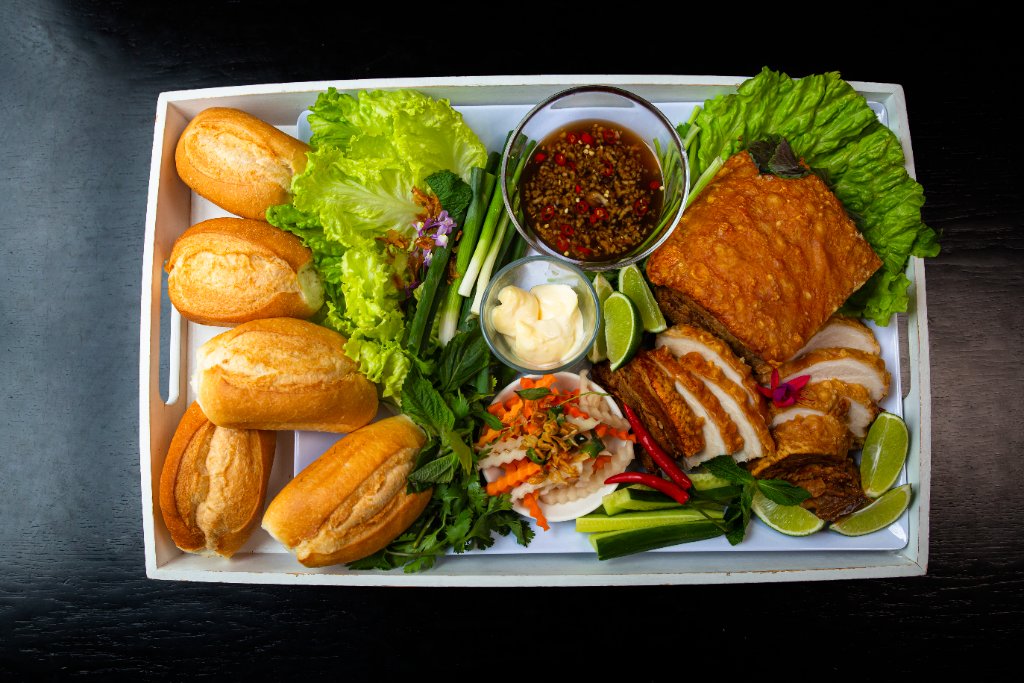 Heo Quay — crispy pork belly with Bánh Mì platter