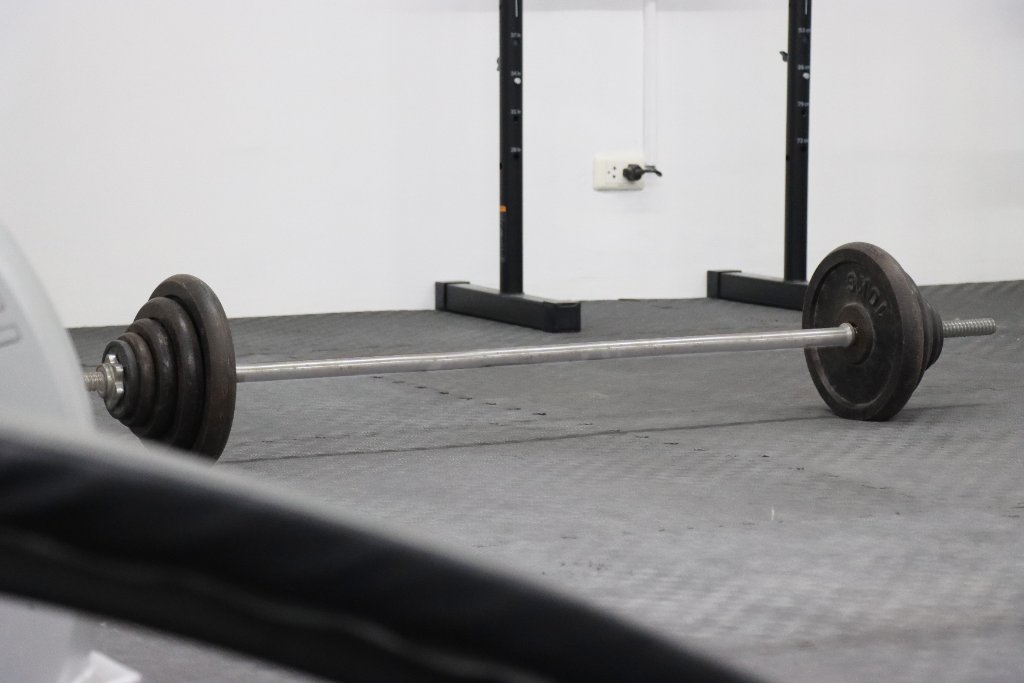 Gym Barbell on Floor