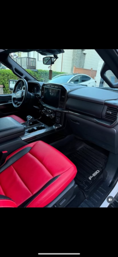 Red and black truck interior after detail work
