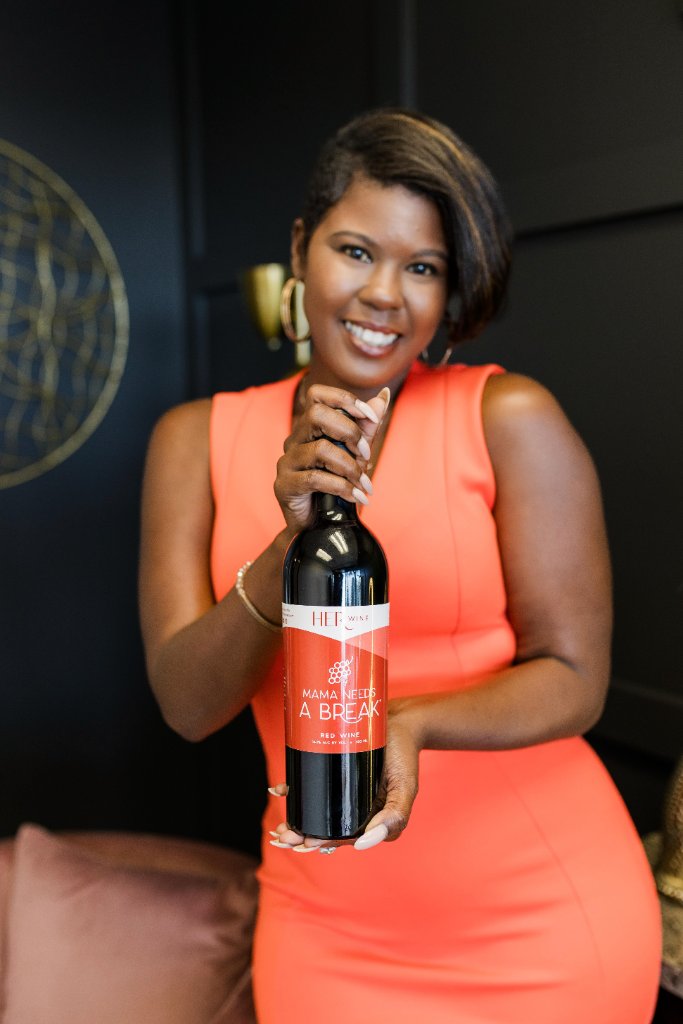 Dr. Nicole Anderson with HER Wine