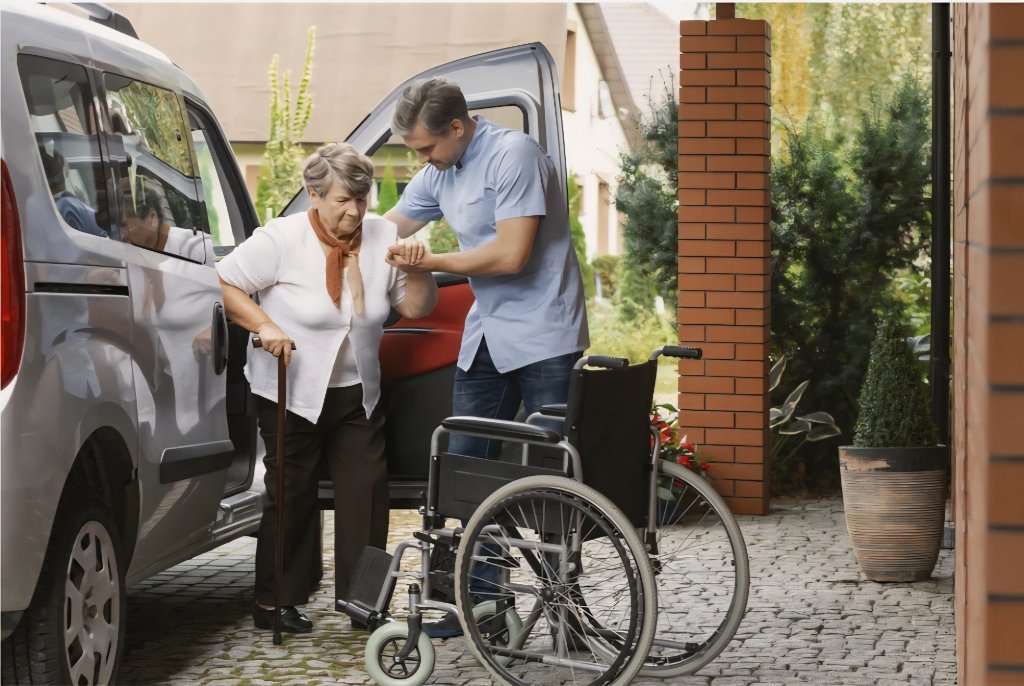 Caregiver helping senior out of van