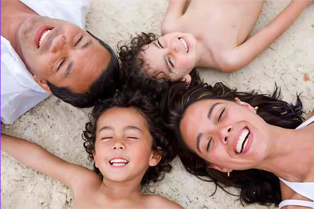 Happy family smiling at Loukia Pedoulou Dental Clinic, Nicosia Cyprus