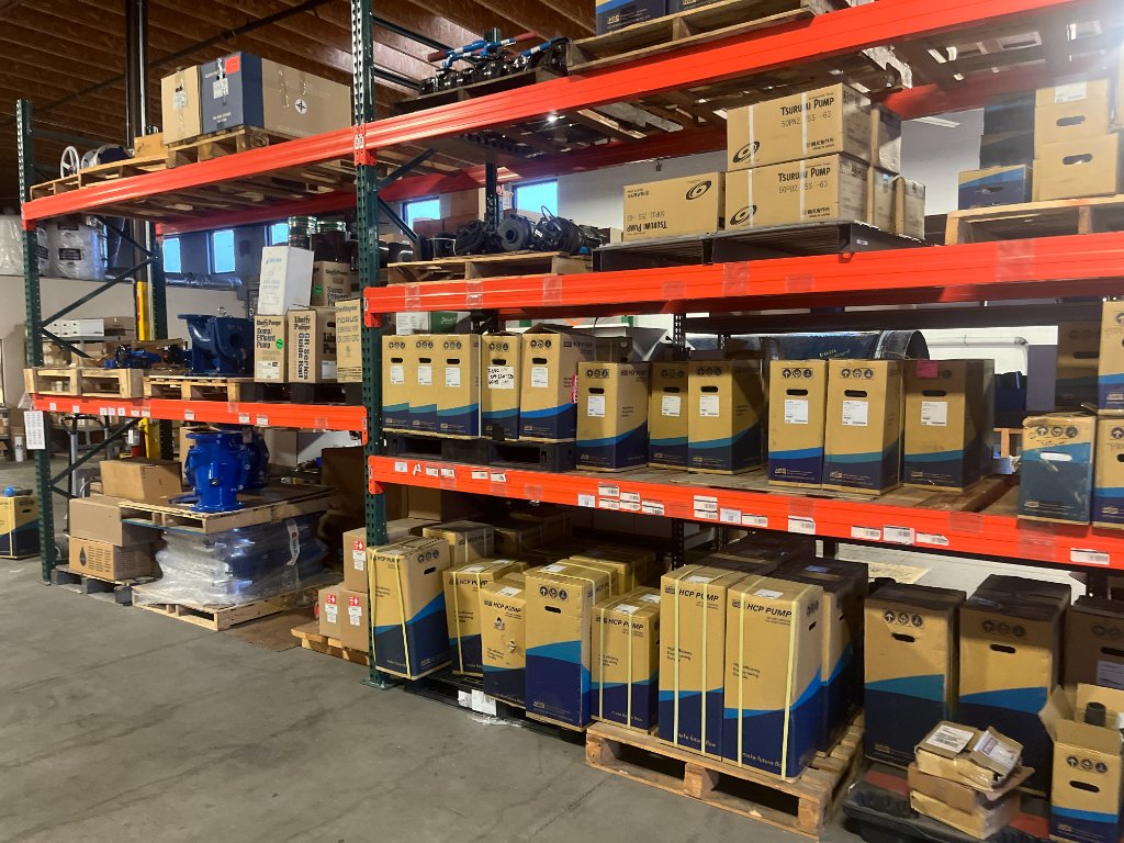 Pump equipment and parts on warehouse shelves