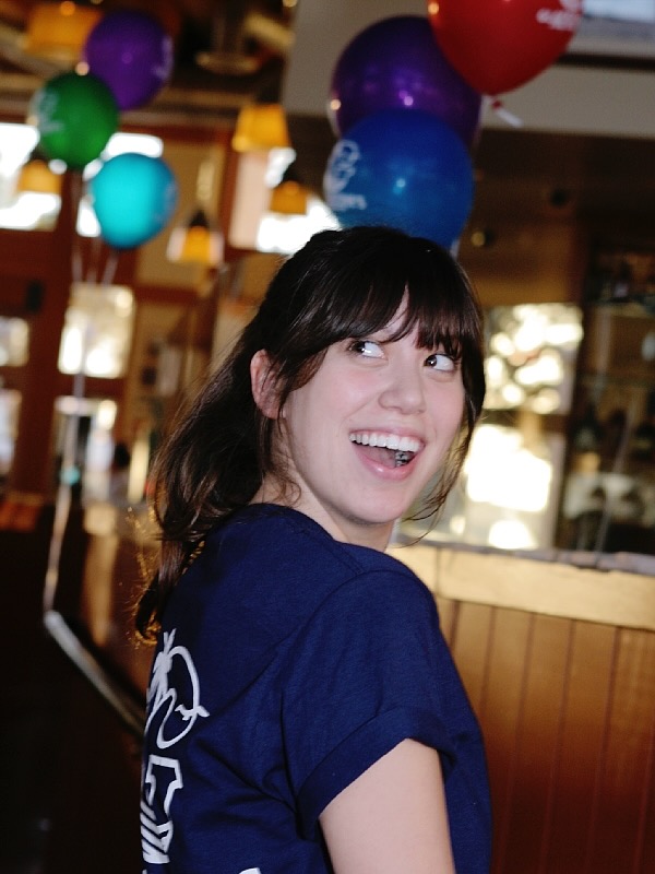 Team member with balloons