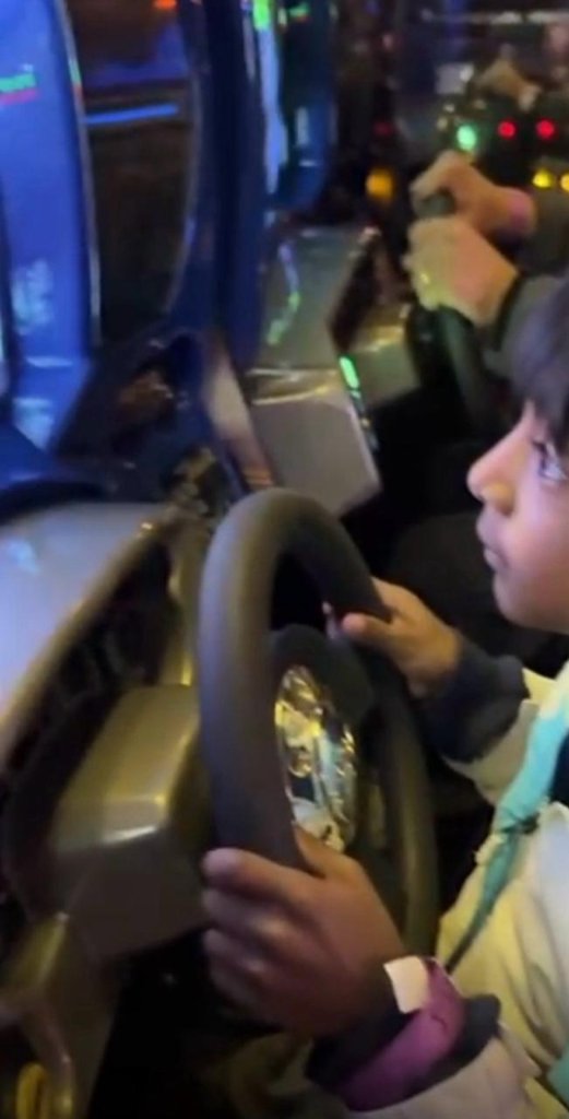 Racing champ at the arcade! 🎮