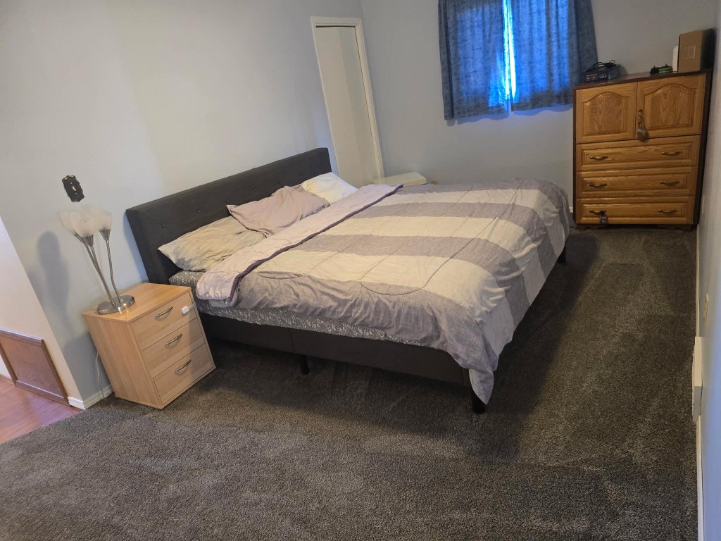 Clean tidy bedroom after professional house cleaning Lethbridge