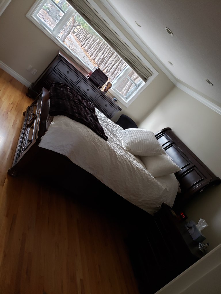 Clean bedroom after professional house cleaning Lethbridge