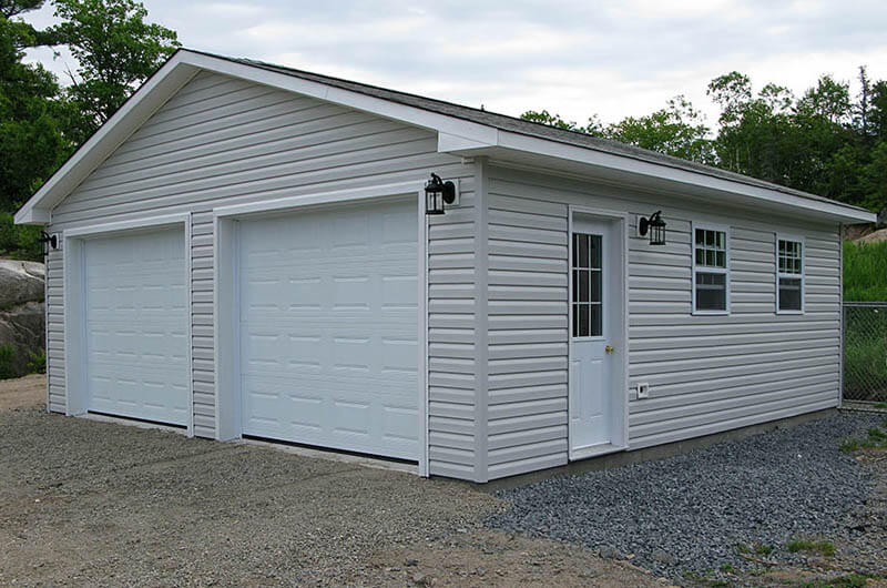 Detached garage with overhead doors
