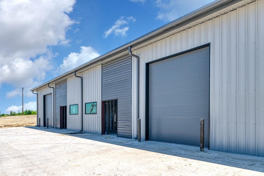 Commercial warehouse with large steel bay overhead doors