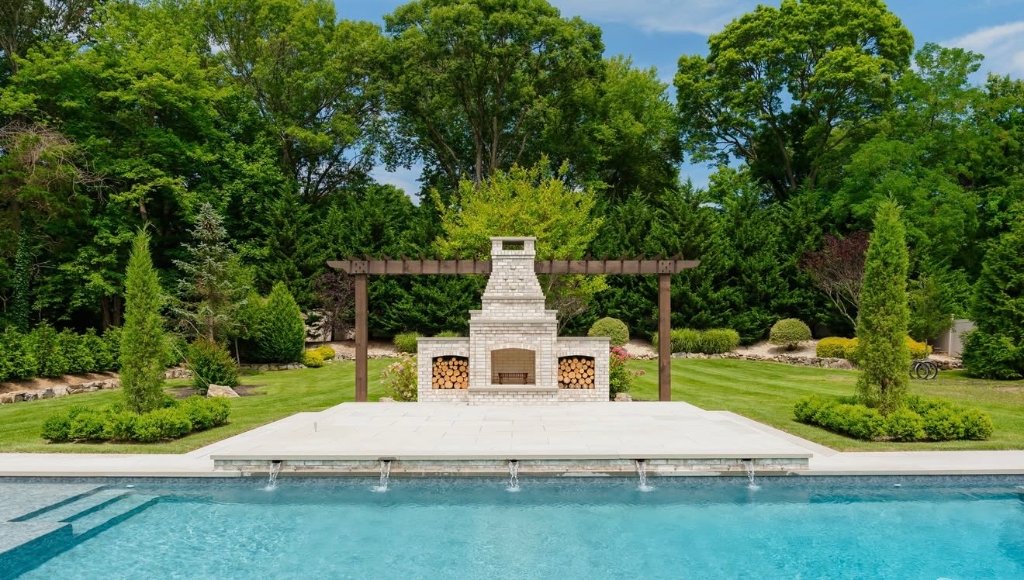 Pool with outdoor fireplace