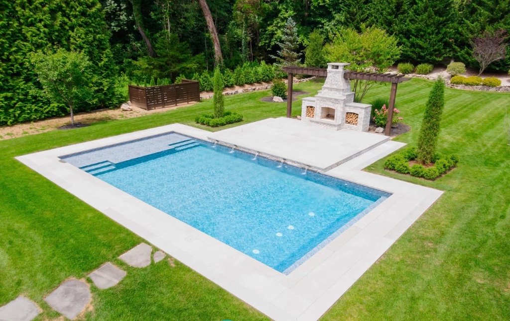 Aerial pool with fireplace pergola