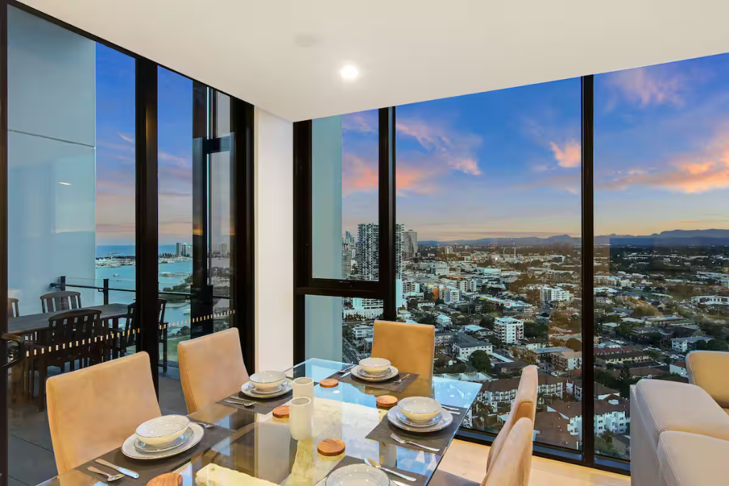 Dining area with panoramic sunset city views