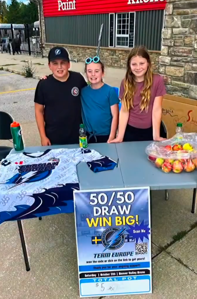 50/50 Draw — players selling tickets