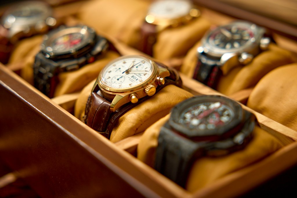 Macro close-up of hand-stitched luxury leather watch strap showing precise saddle stitching