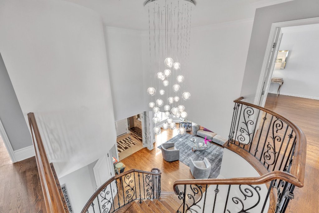 Grand luxury chandelier in a two-story foyer