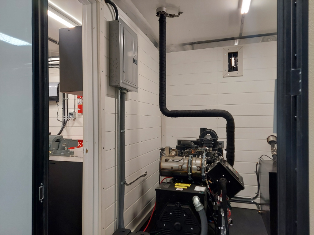 Diesel engine and air compressor system in generator compartment
