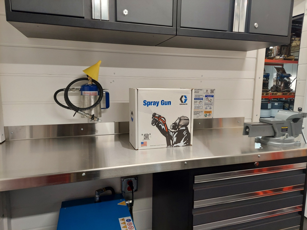Interior trailer workspace showing proportioner systems, storage, and equipment layout