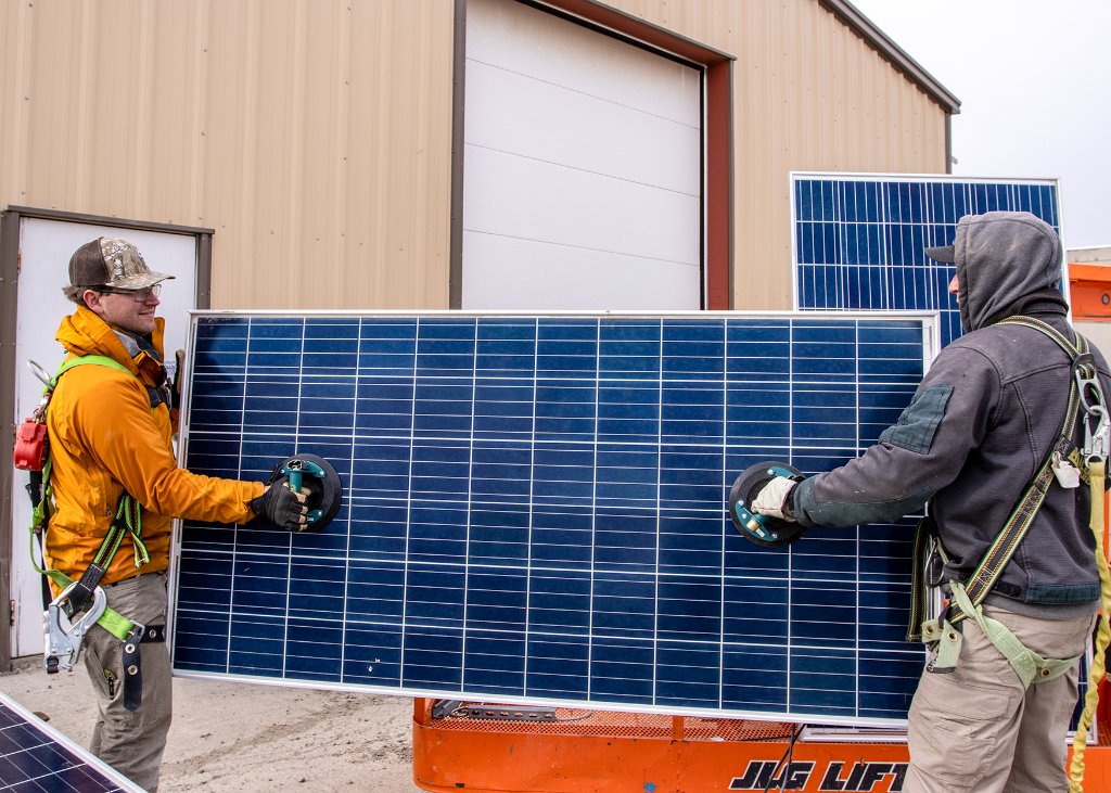 Solar Panel Handling - Two Workers