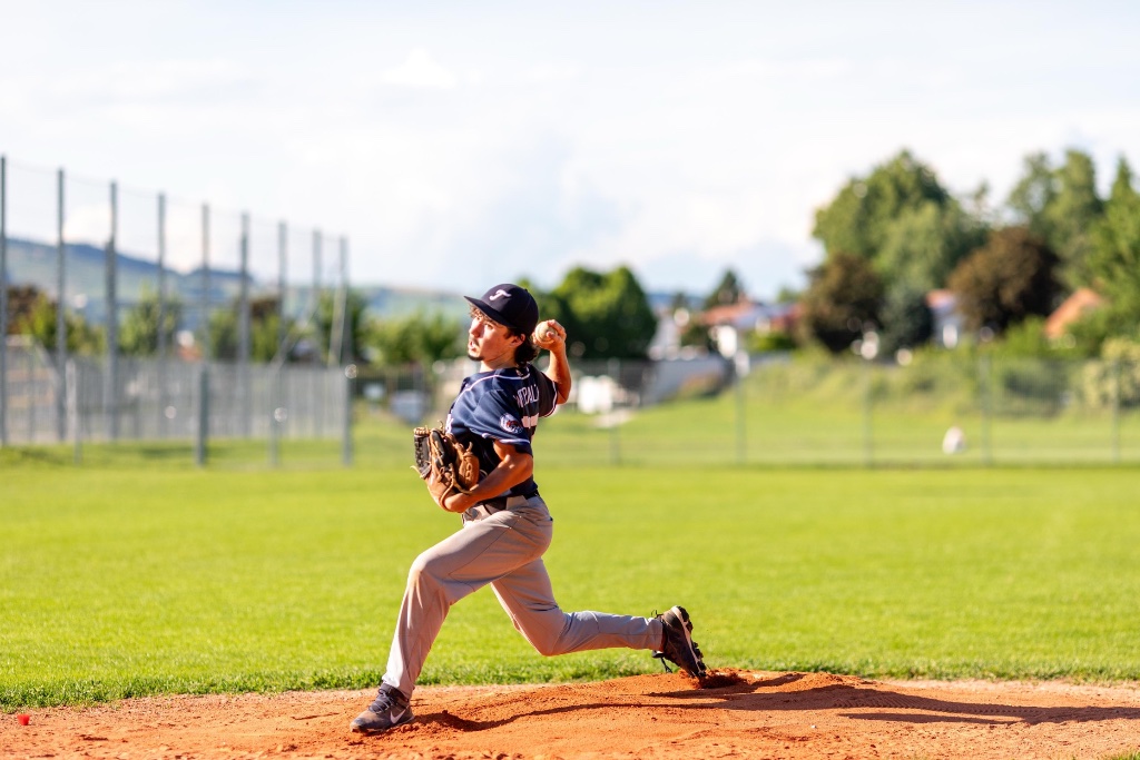 Geneva Tigers pitcher on the mound — play baseball Geneva