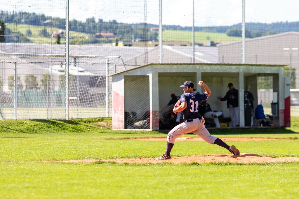 Geneva Tigers pitcher delivering — baseball game in Geneva Switzerland