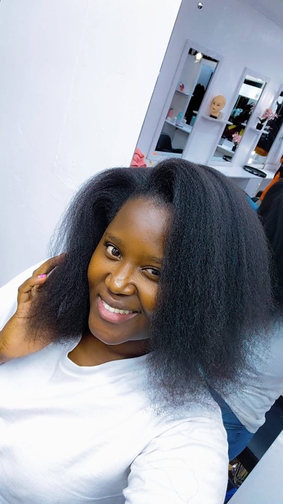 Knotless braids with curly ends