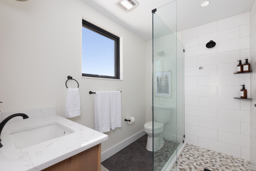 Bathroom 2 — glass walk-in shower & vanity
