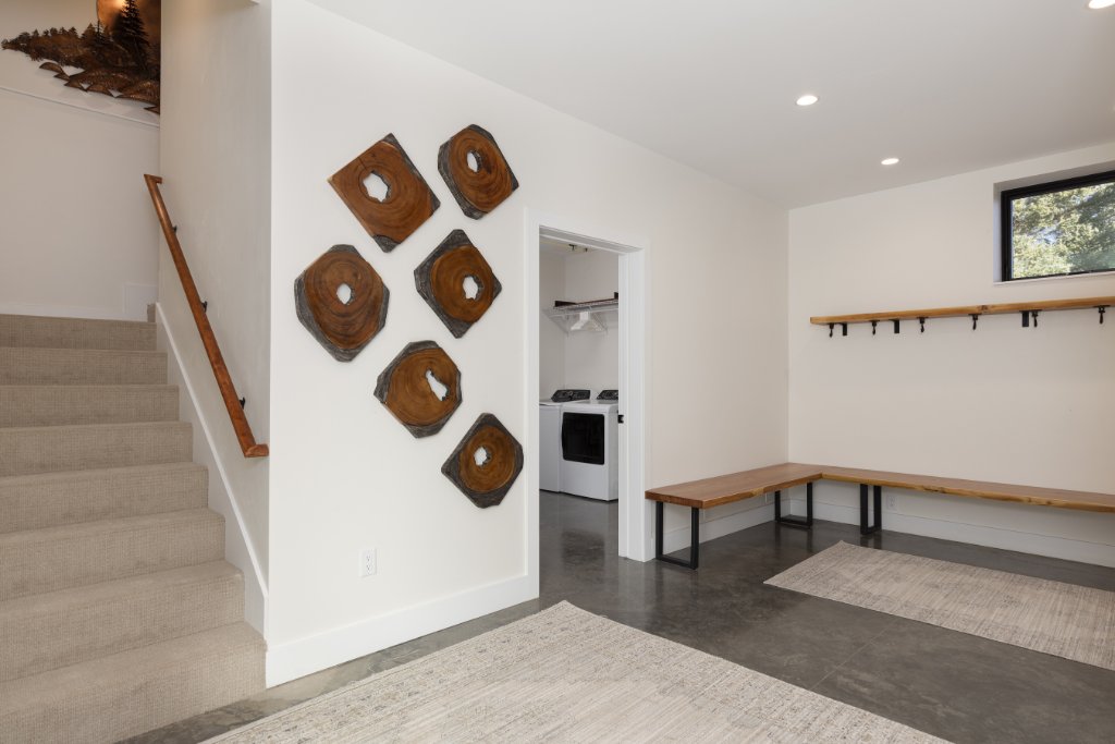 Entryway — mudroom with bench, hooks & laundry room access