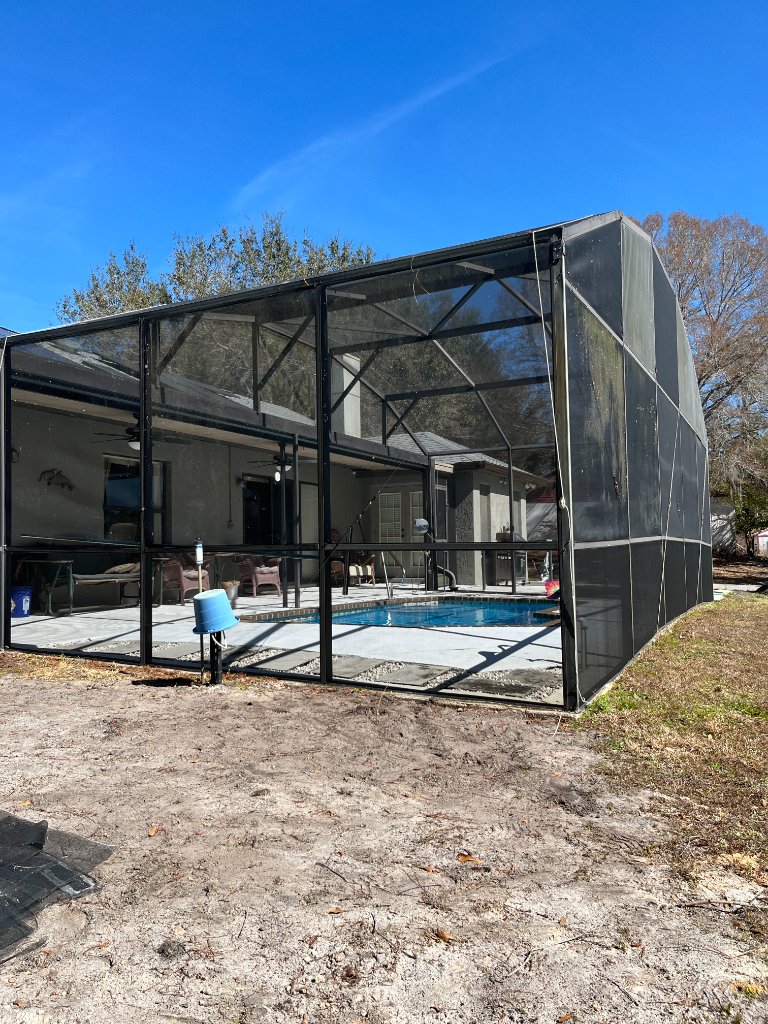 DeBary Pool Screen Repair — pool cage roof panels being replaced, Volusia County