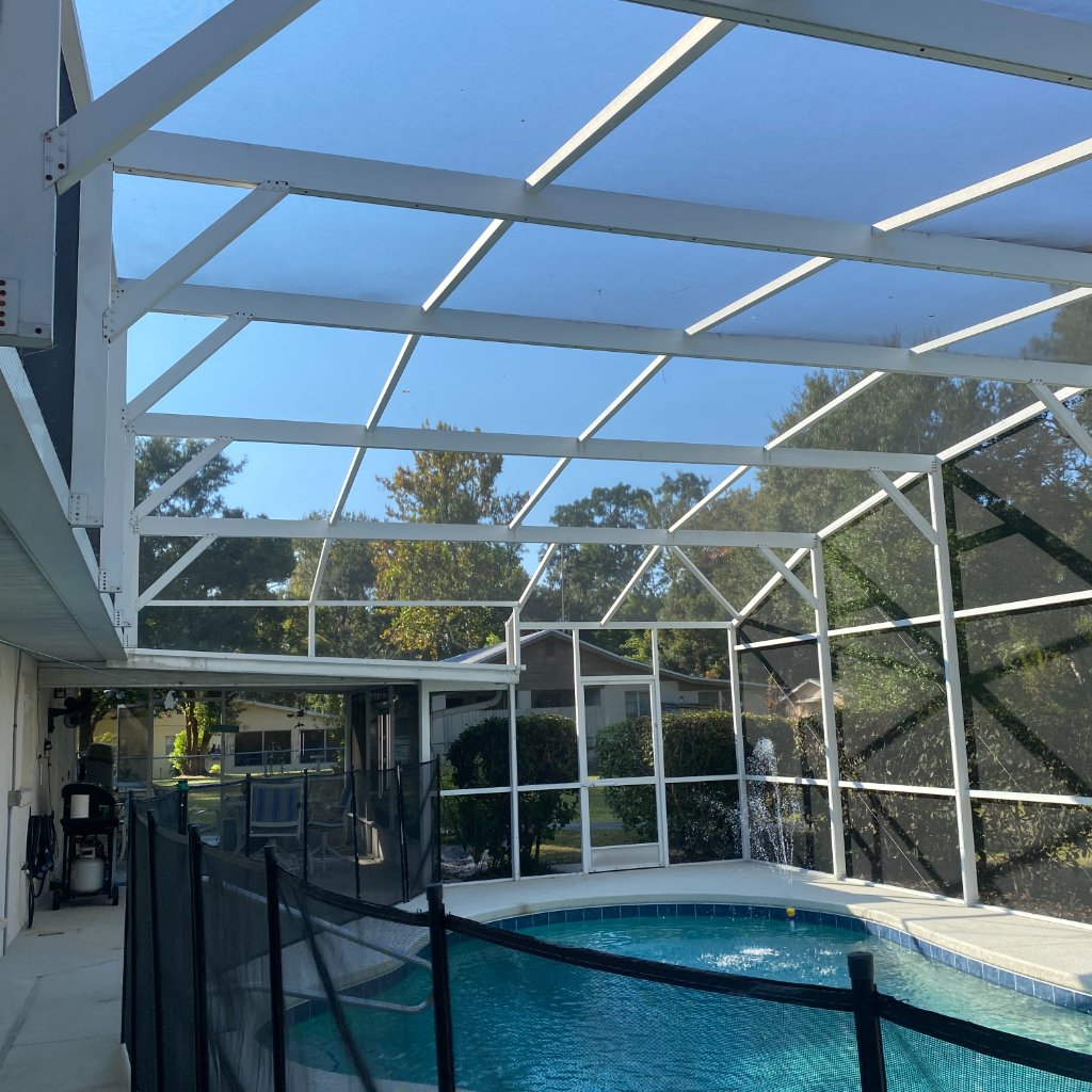 DeBary Pool Screen Repair — white frame pool enclosure panel replacement
