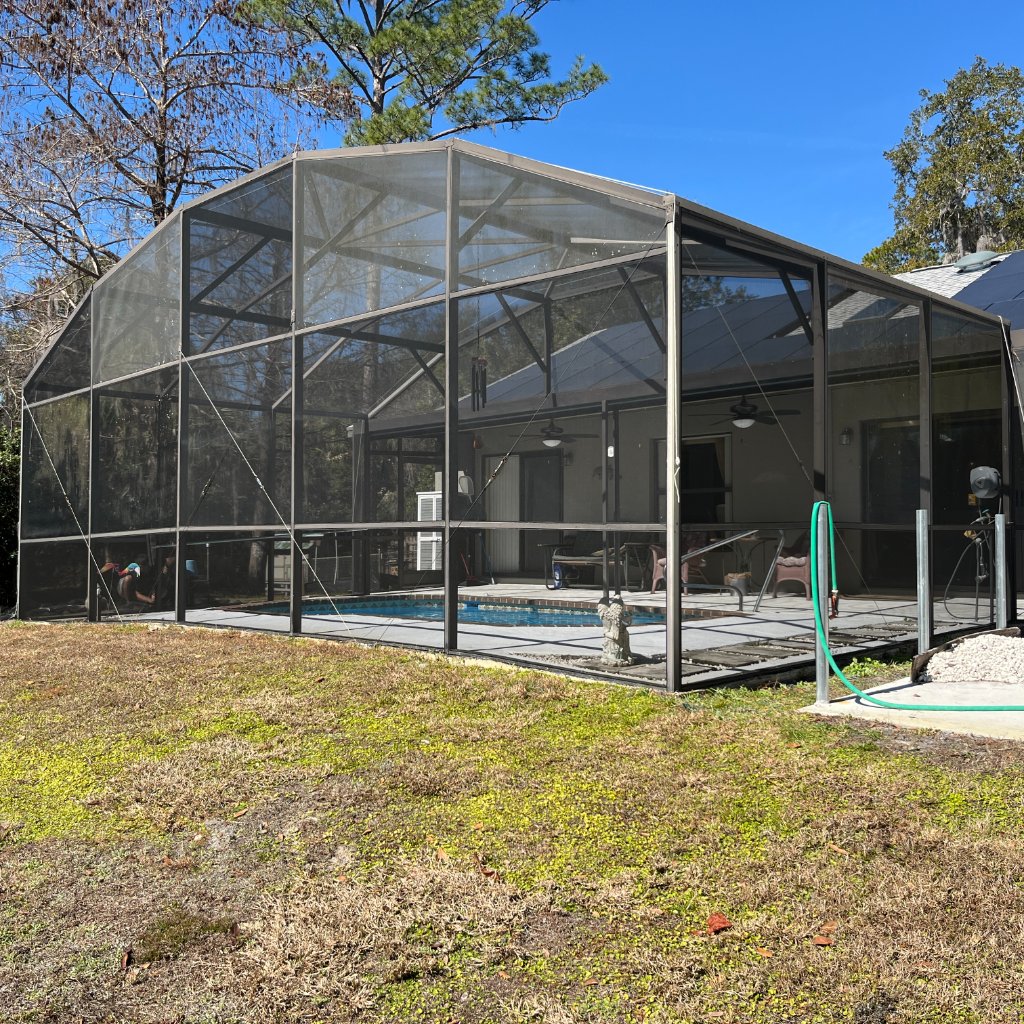 DeBary Pool Cage Screen Repair — installing large roof panel, DeBary Screen Repair crew