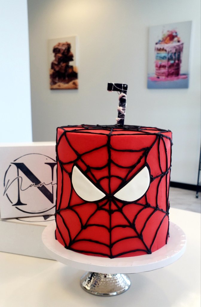 Spider-Man themed red cake