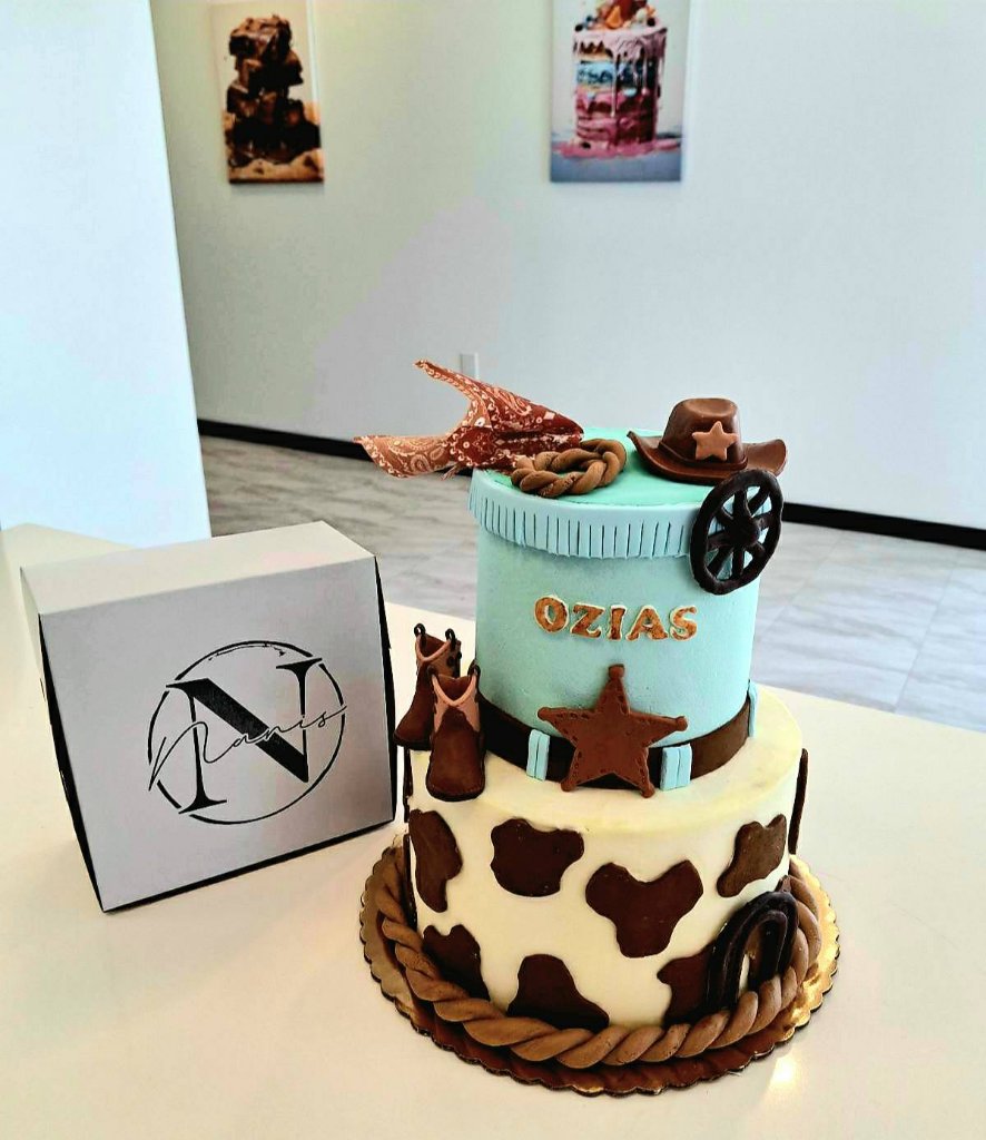 Cowboy-themed two-tier cake named Ozias