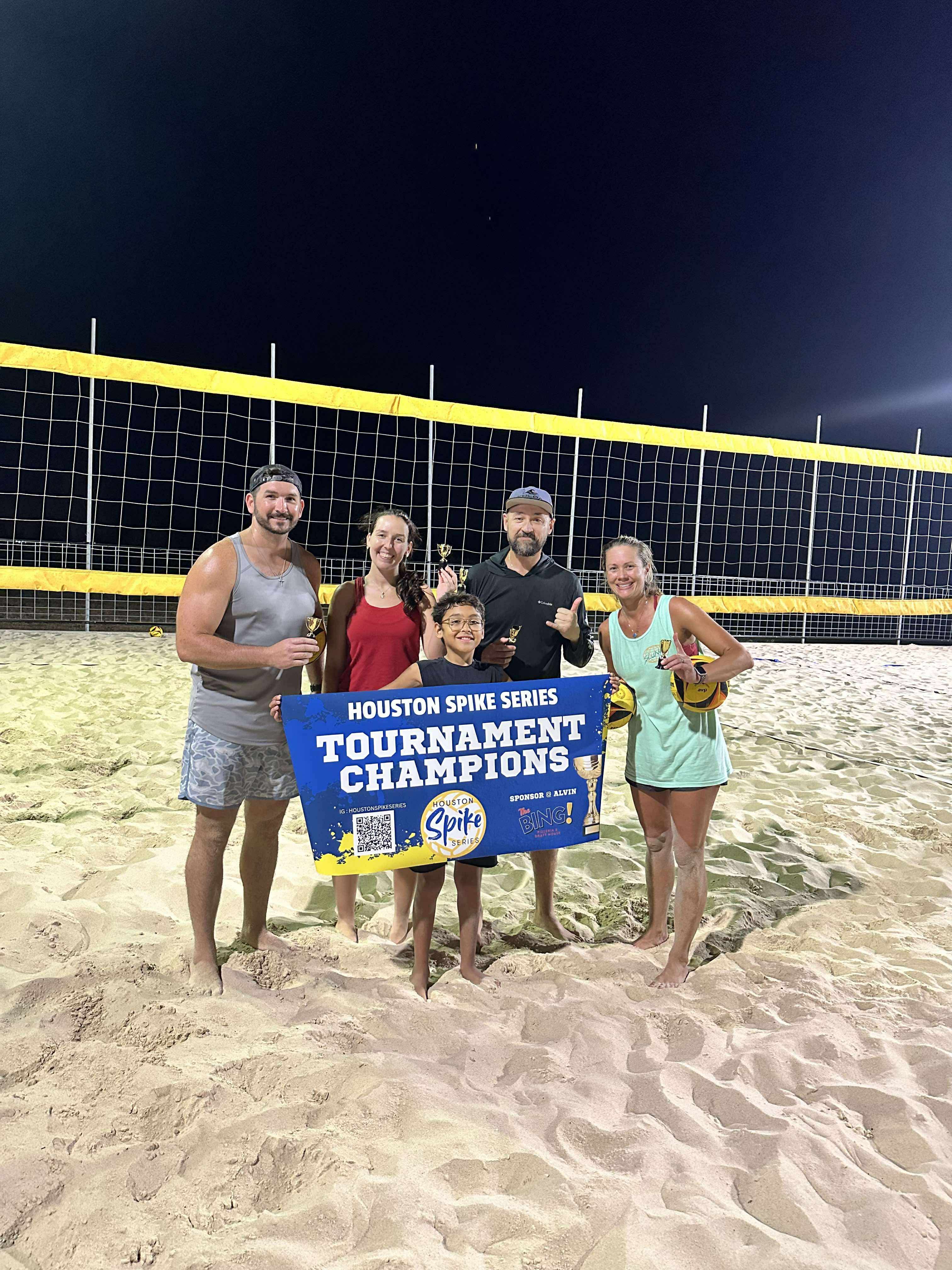 Tournament champions with banner