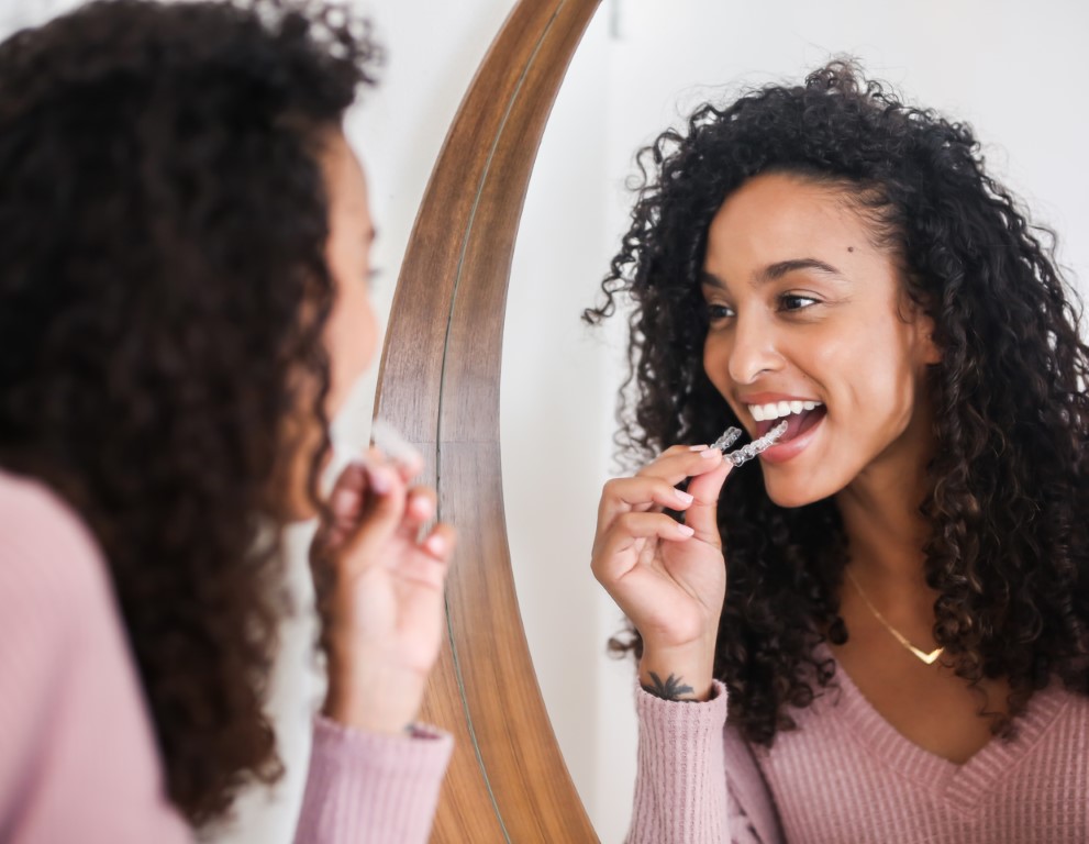 Woman with aligners