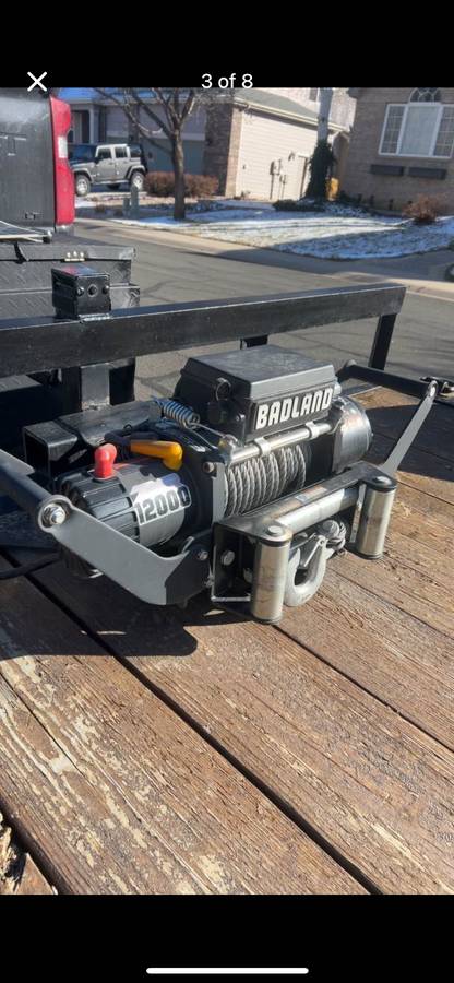 Badland 12,000 lb winch on Precision Rentals trailer