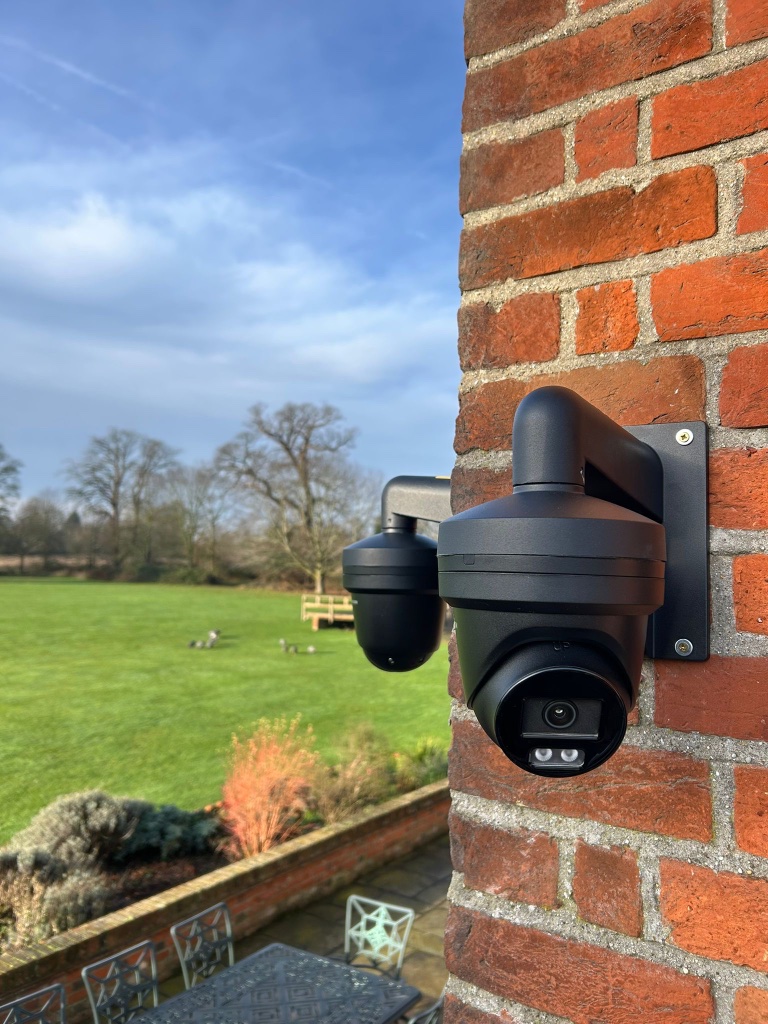 CCTV camera installation on brick wall