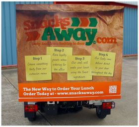 The back of the Snacks Away tuk tuk, the four ordering steps printed across it