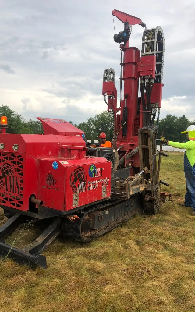 IET field crew conducting in situ remediation injection at an industrial contaminated site