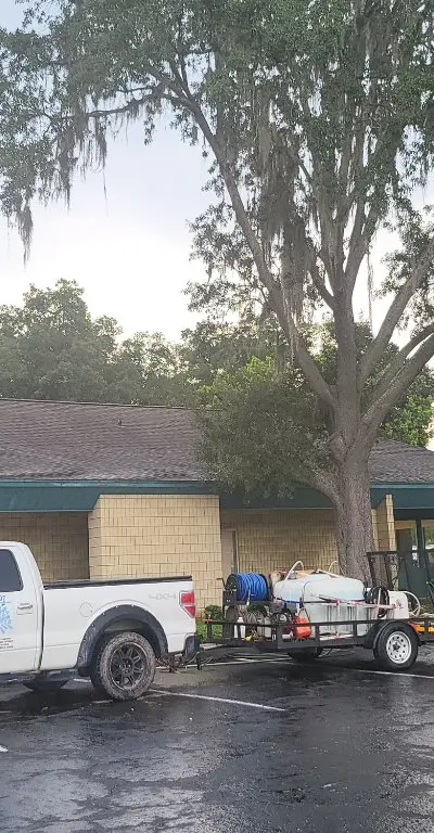 Commercial building softwash with Under Pressure truck
