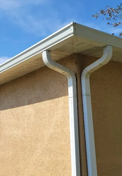 Clean gutters and downspout after washing