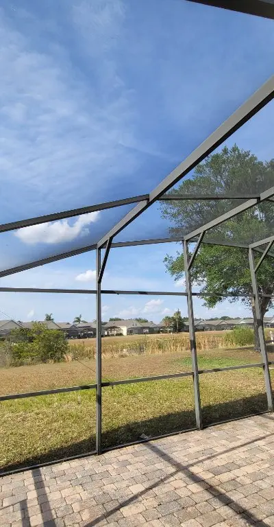 Pool enclosure cleaning with pool visible